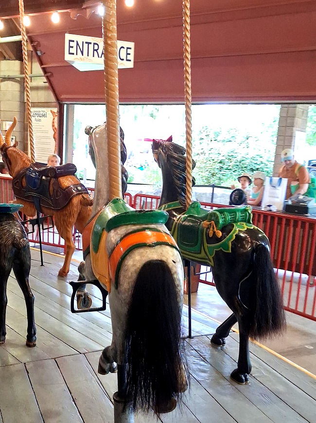 real horsehair tails on the carved wooden horses